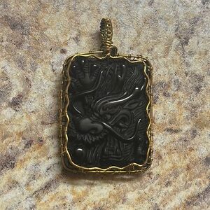 Onyx dragon pendant